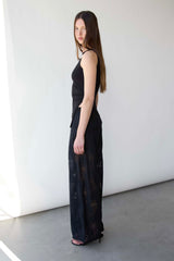 FITTED SLEEVELESS TOP WITH ASYMMETRICAL HEM
