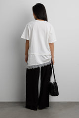 ASYMMETRICAL TOP WITH LACE TRIM