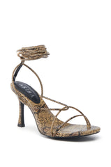 AKIRA HIGH TOWER NUDE SNAKE LACE UP SANDAL
