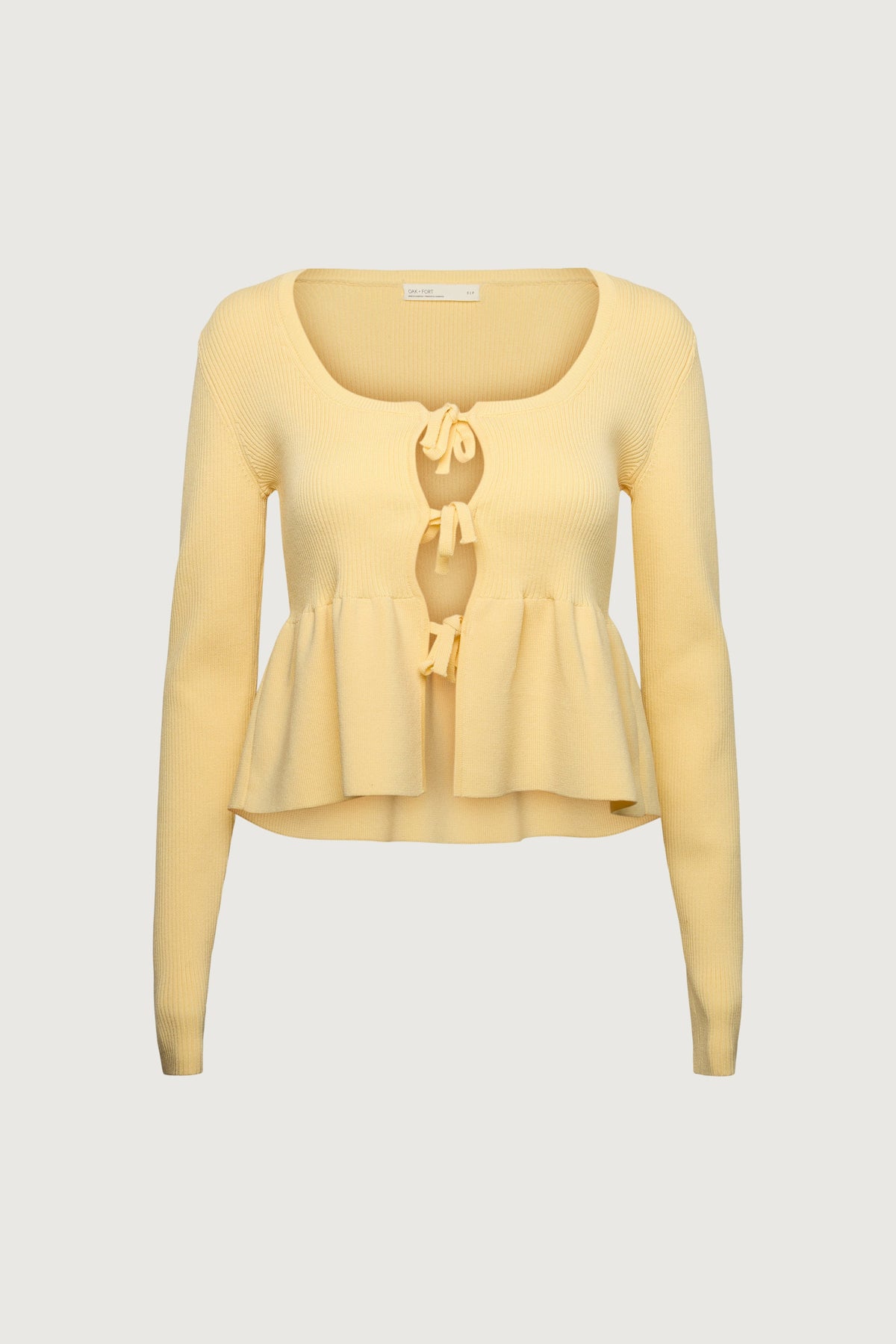 RIBBED TIE FRONT PEPLUM SWEATER