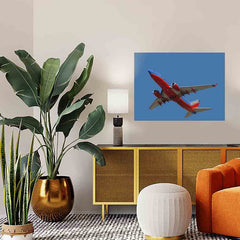 24x36 Southwest 737 Flyover Poster Displayed Above Console Table